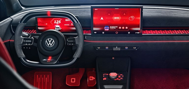 Førerpladsen i VW ID. GTI med rød belysning.